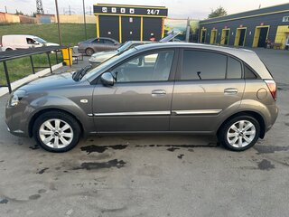 2010 Kia Rio II Рестайлинг, серебристый, 545000 рублей, вид 2
