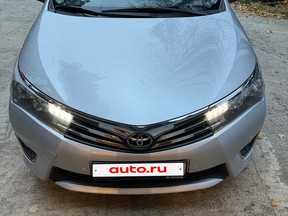 2013 Toyota Corolla XI (E160, E170, E180), серебристый
