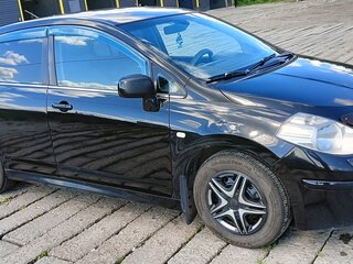 2010 Nissan Tiida I Рестайлинг, чёрный, 700000 рублей, вид 3