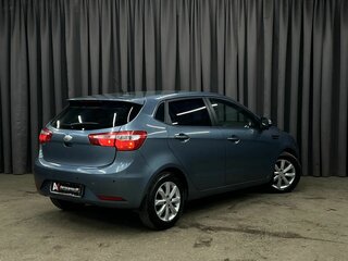 2014 Kia Rio 5-speed III, серый, 899888 рублей, вид 4