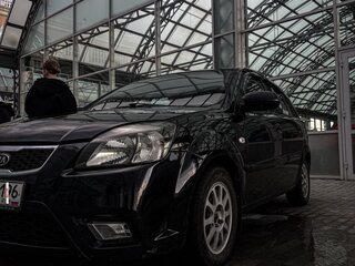 2010 Kia Rio II Рестайлинг, чёрный, 530000 рублей, вид 1