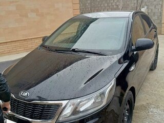 2014 Kia Rio 4-speed III, чёрный, 800000 рублей, вид 1
