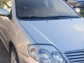 2005 Toyota Corolla IX (E120, E130) Рестайлинг, серебристый, 565000 рублей, вид 2