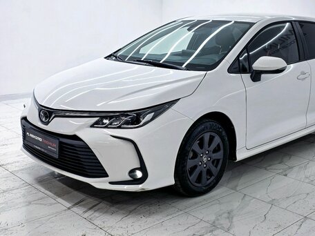 2022 Toyota Corolla XII (E210), белый, 2000000 рублей, вид 2