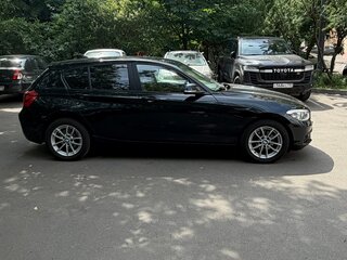 2018 BMW 1 серии 118i II (F20/F21) Рестайлинг 2, чёрный, 1700000 рублей, вид 4
