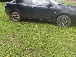 2011 Mitsubishi Lancer X Рестайлинг, чёрный, 700000 рублей, вид 2