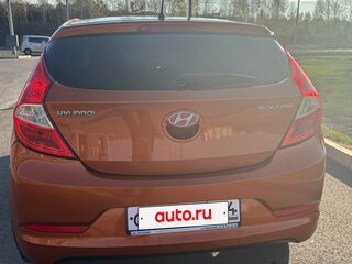 2014 Hyundai Solaris I Рестайлинг, оранжевый, 950000 рублей, вид 4
