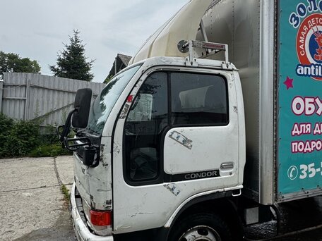 1992 Nissan Atlas, белый, 980000 рублей, вид 3