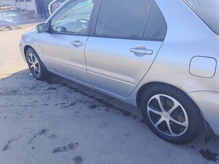 2004 Mitsubishi Lancer IX, серебристый, 370000 рублей, вид 2