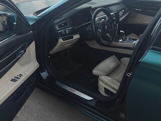 2011 BMW 7 серии 740d xDrive V (F01/F02/F04), зелёный, 1800000 рублей, вид 5