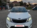 2012 Kia Rio 4-speed III, белый, 650000 рублей - вид 2