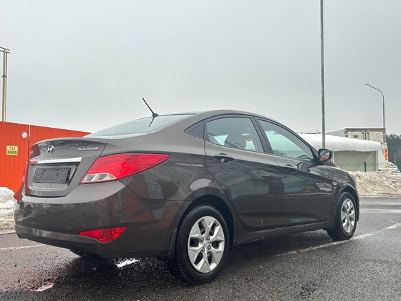 2014 Hyundai Solaris I Рестайлинг, коричневый, 950000 рублей - вид 5