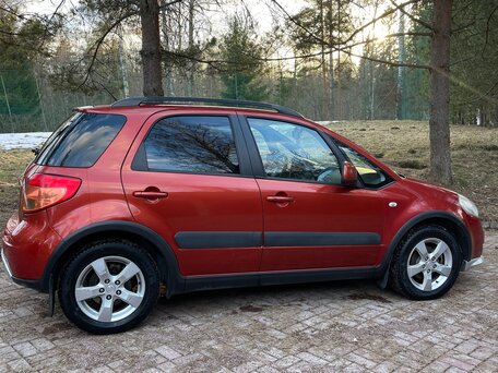 2010 Suzuki SX4 I (Classic) Рестайлинг, оранжевый, 700000 рублей, вид 3