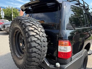 2003 Toyota Land Cruiser 100 Series Рестайлинг 1, чёрный, 1700000 рублей, вид 4