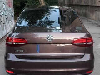 2016 Volkswagen Jetta VI Рестайлинг, коричневый, 960000 рублей, вид 3