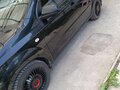 2009 Chevrolet Aveo I Рестайлинг, чёрный, 505000 рублей - вид 2
