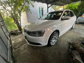 2011 Volkswagen Jetta VI, белый, 750000 рублей, вид 1