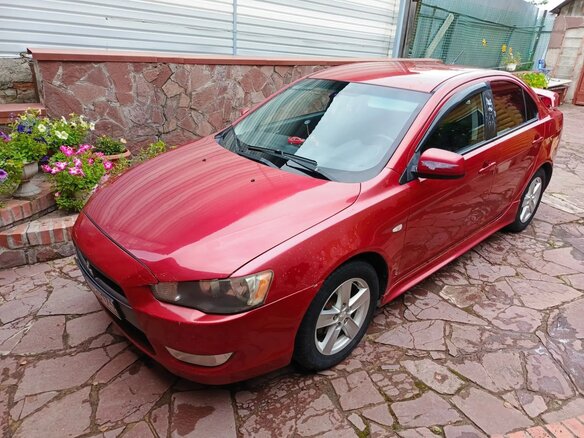 2008 Mitsubishi Lancer X, красный, 680000 рублей