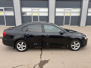 2012 Volkswagen Jetta VI, чёрный, 1000000 рублей, вид 4