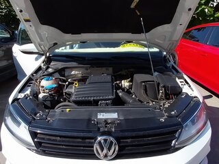 2016 Volkswagen Jetta VI Рестайлинг, белый, 1650000 рублей, вид 2