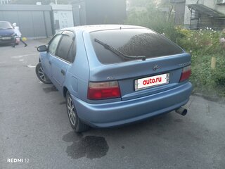 1995 Toyota Corolla VII (E100), синий, 250000 рублей, вид 4