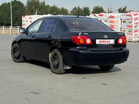2003 Toyota Corolla IX (E120, E130), чёрный, 300000 рублей, вид 4