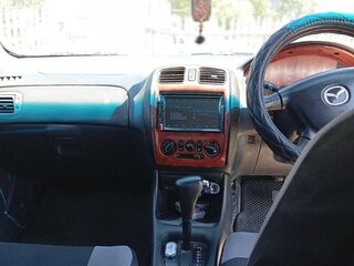 1999 Mazda Familia VIII (BJ), серый, 250000 рублей, вид 5