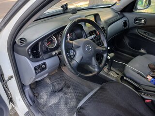 2004 Nissan Almera II (N16) Рестайлинг, белый, 350000 рублей, вид 5