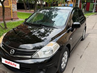 2011 Nissan Tiida I Рестайлинг, чёрный, 810000 рублей, вид 1