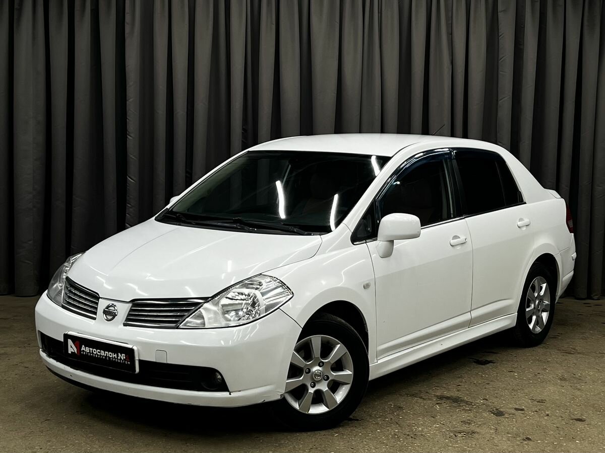 Открыть фотографии: Nissan Tiida I Рестайлинг