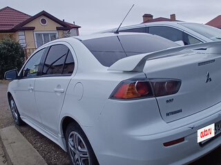 2011 Mitsubishi Lancer X Рестайлинг, белый, 600000 рублей, вид 2