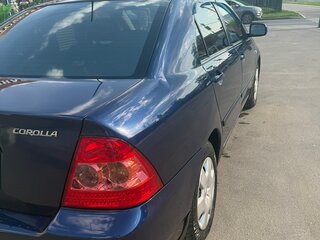2006 Toyota Corolla IX (E120, E130) Рестайлинг, синий, 600000 рублей, вид 5