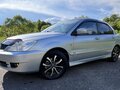 2006 Mitsubishi Lancer IX Рестайлинг, серебристый, 530000 рублей - вид 1