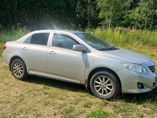 2008 Toyota Corolla X (E140, E150), серебристый, 650000 рублей, вид 2