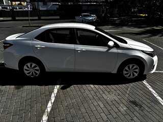 2014 Toyota Corolla XI (E160, E170, E180), белый, 1300000 рублей, вид 3