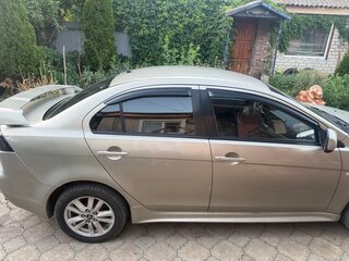 2009 Mitsubishi Lancer X, бежевый, 730000 рублей, вид 2