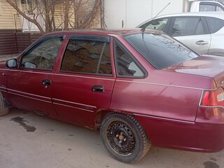 2011 Daewoo Nexia I Рестайлинг, пурпурный, 230000 рублей, вид 3