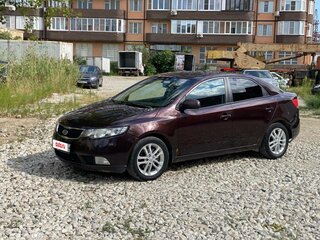 2011 Kia Cerato 6-speed II, пурпурный, 540000 рублей, вид 1