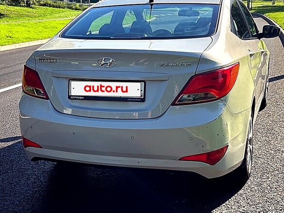 2014 Hyundai Solaris I Рестайлинг, бежевый, 859000 рублей - вид 3