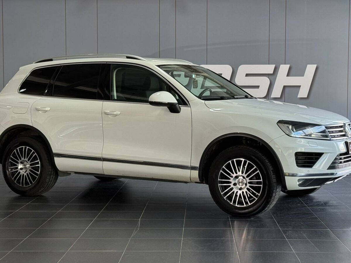 Открыть фотографии: Volkswagen Touareg II Рестайлинг