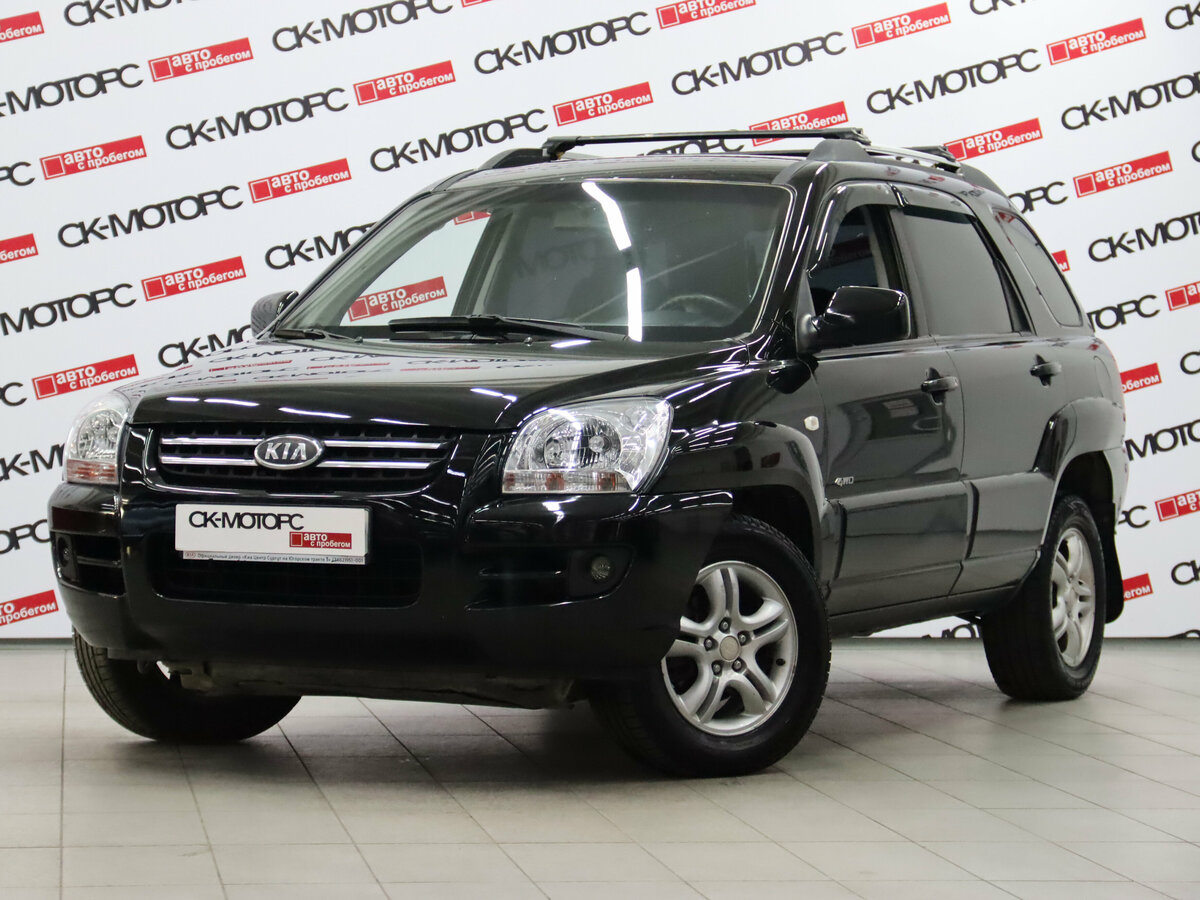 Открыть фотографии: Kia Sportage II