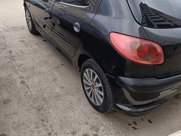 2006 Peugeot 206, чёрный - вид 3