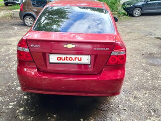 2011 Chevrolet Aveo I Рестайлинг, красный, 370000 рублей, вид 4