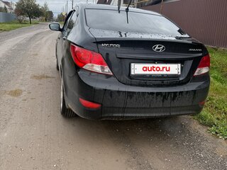 2013 Hyundai Solaris I, чёрный, 950000 рублей, вид 3