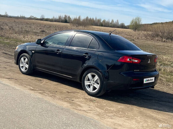 2008 Mitsubishi Lancer X, чёрный, 650000 рублей - вид 22