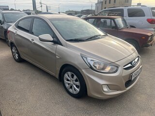 2011 Hyundai Solaris I, бежевый, 589000 рублей, вид 1