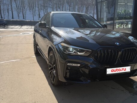 2022 BMW X6 40i III (G06), чёрный, 9500000 рублей, вид 1