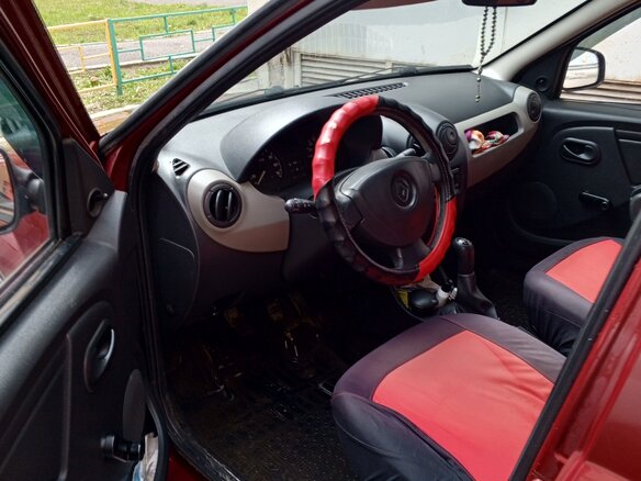 2012 Renault Logan I Рестайлинг, красный - вид 2