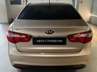 2013 Kia Rio 5-speed III, бежевый, 890000 рублей, вид 3