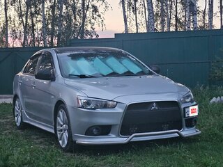 2012 Mitsubishi Lancer X Рестайлинг, серебристый, 900000 рублей, вид 3